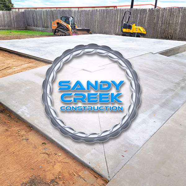 Concrete pad and site preparation project by Sandy Creek Construction